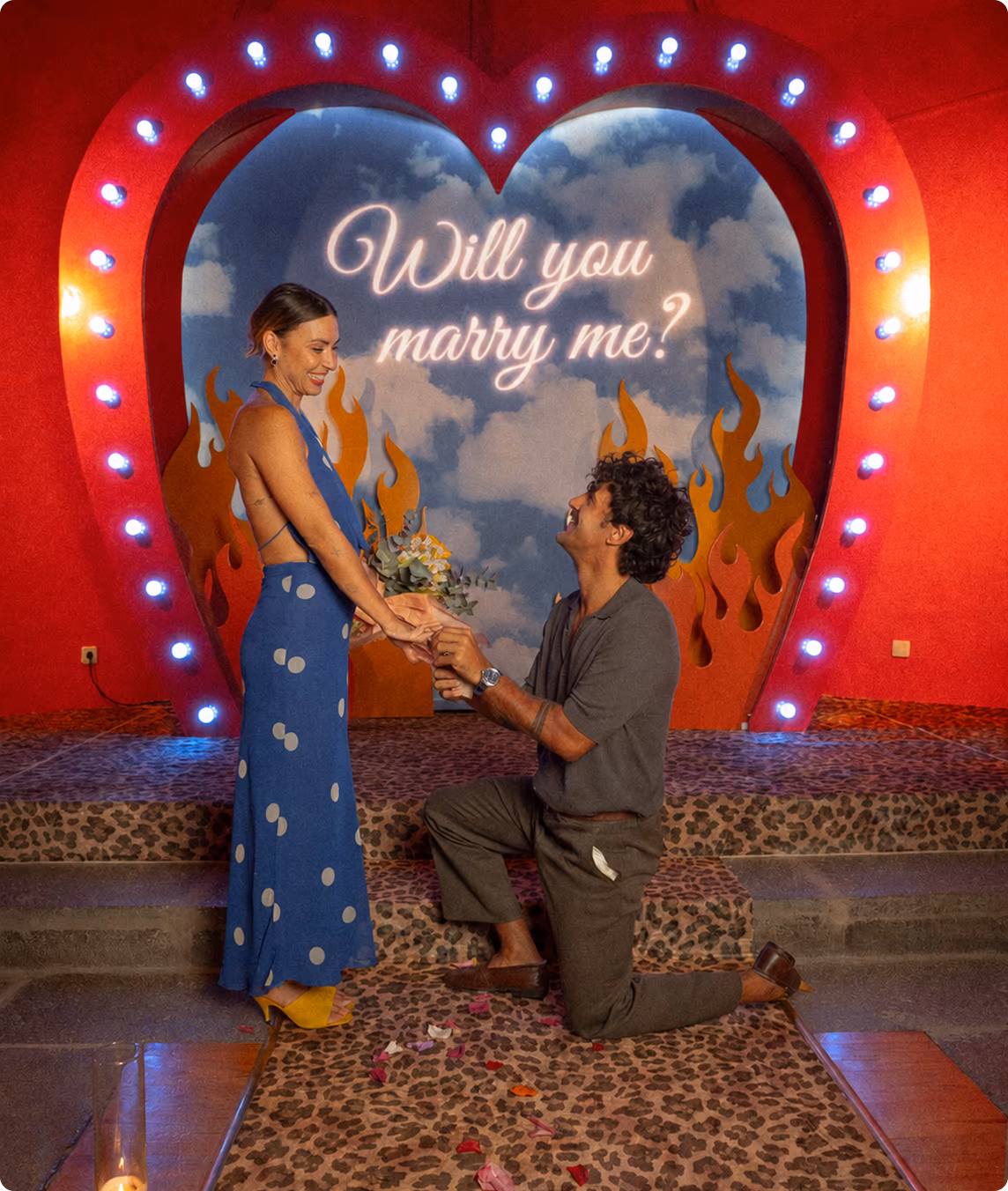 Couple at a surprise proposal with a light-up heart at Magic Chapel Lanzarote
